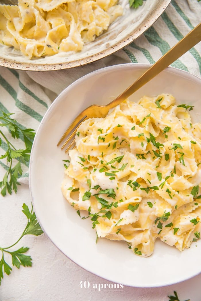 Cottage cheese alfredo with fettuccine noodles in a bowl