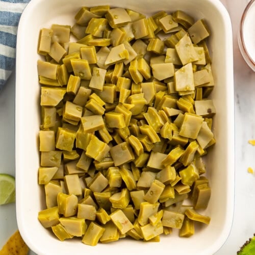 Top-down photo of a casserole dish filled with diced nopales.