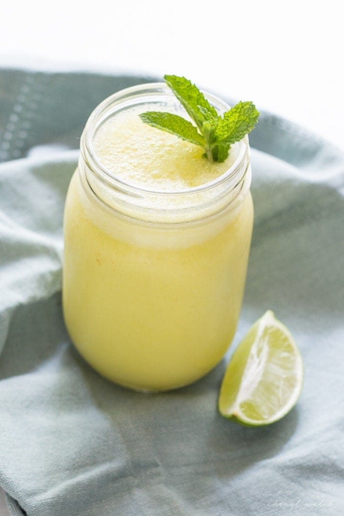 Mango mojito smoothie. Literally, summer in a glass. Creamy, frothy, sweet, fresh.. just perfect.