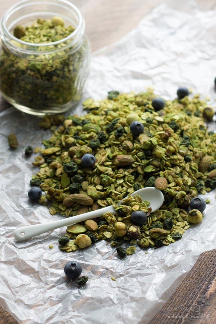 Matcha granola with dried blueberries. All of the goodness of matcha powder tossed with a delish granola. Perfect snack or breakfast--tons of antioxidants! Vegan