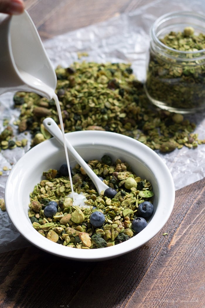 Matcha granola with dried blueberries. All of the goodness of matcha powder tossed with a delish granola. Perfect snack or breakfast--tons of antioxidants! Vegan