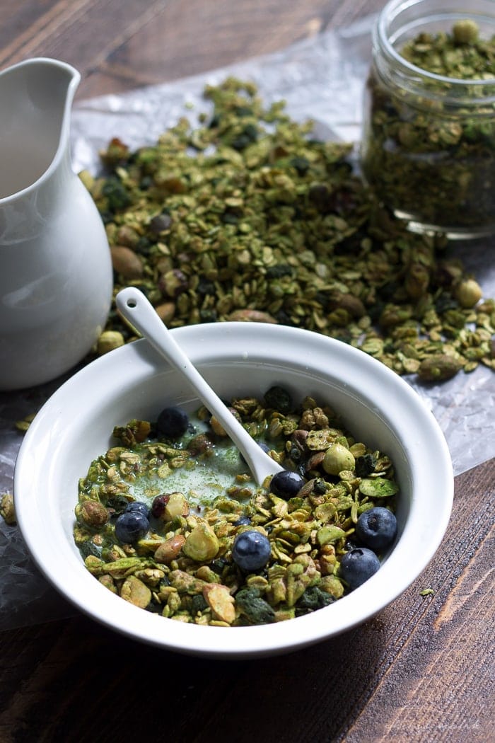 Matcha granola with dried blueberries. All of the goodness of matcha powder tossed with a delish granola. Perfect snack or breakfast--tons of antioxidants! Vegan