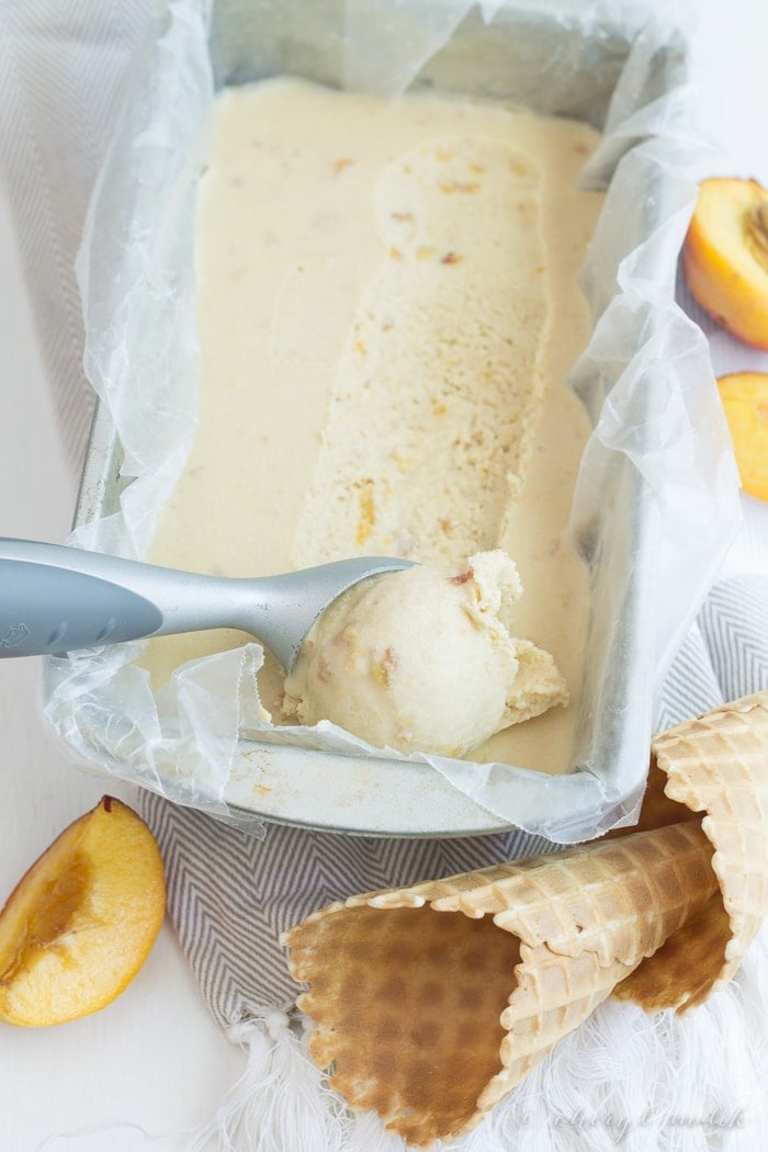 Vegan Peach Ice Cream. 7 ingredients, no refined sugars, no gluten. Just tons of peaches and coconut milk and summery goodness!