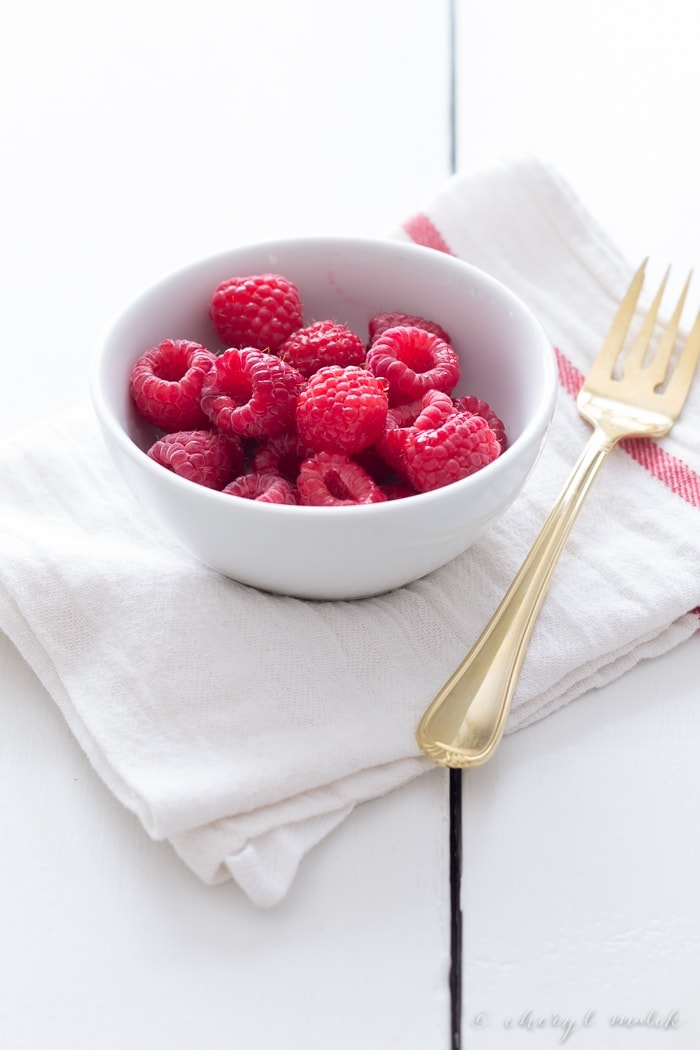 The simplest ever raspberries and cream: tart, juicy raspberries and sweet, creamy sweetened condensed milk. Too delicious not to share.