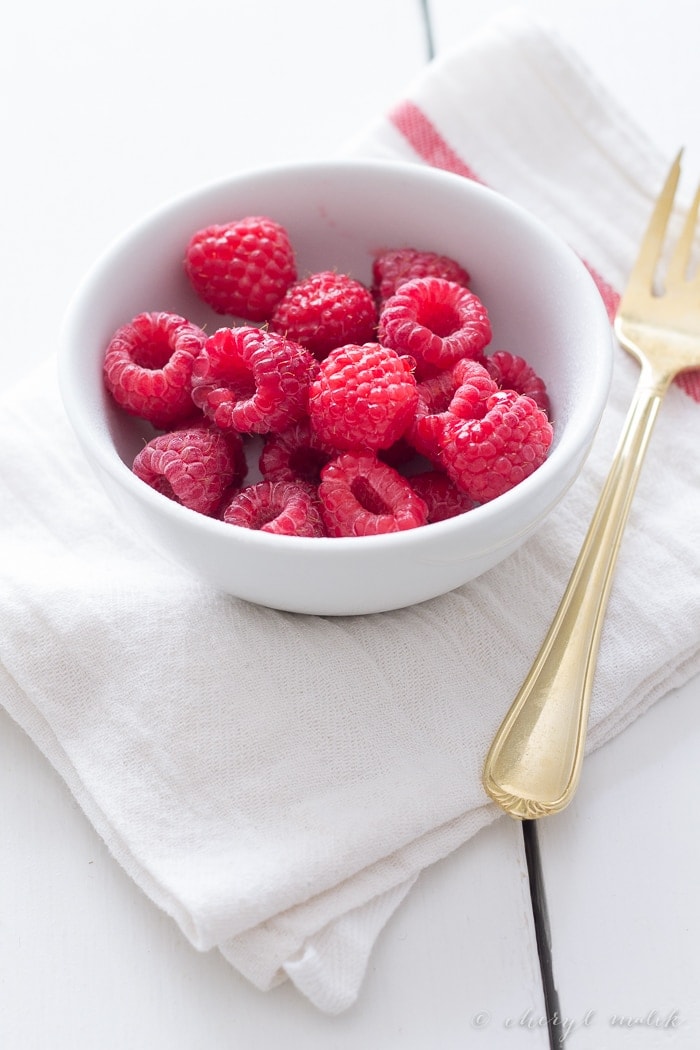 The simplest ever raspberries and cream: tart, juicy raspberries and sweet, creamy sweetened condensed milk. Too delicious not to share.