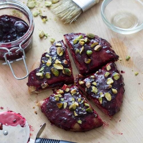 Breakfast Pizza (vegan). Whole wheat pita, salty pistachios, and fruity, gooey jam. So versatile and perfectly satisfying in the morning!