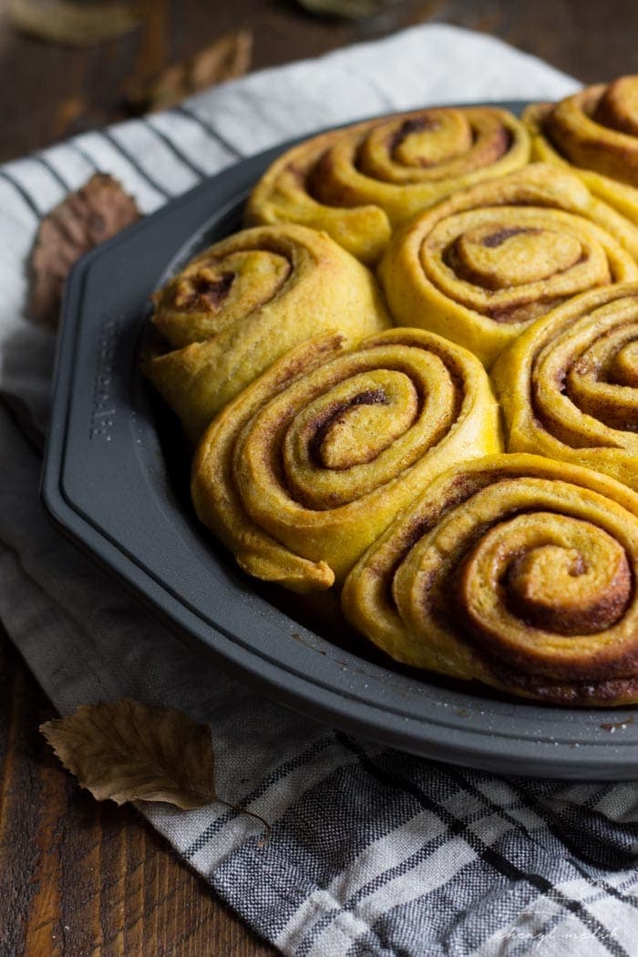 Vegan pumpkin cinnamon rolls with a maple-cream cheese glaze - simplified and ready in about 2 hours, these are the perfect fall breakfast