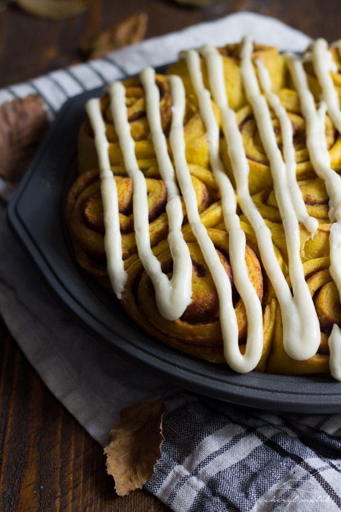 Vegan pumpkin cinnamon rolls with a maple-cream cheese glaze - simplified and ready in about 2 hours, these are the perfect fall breakfast