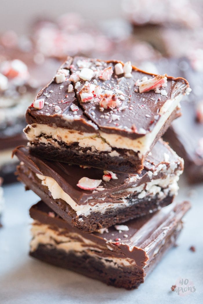 Peppermint layer brownies. Unbelievable peppermint chocolate layered brownies: tender brownie, creamy cool frosting, and rich pepperminty ganache. Oh. My. Heavens. // 40 Aprons