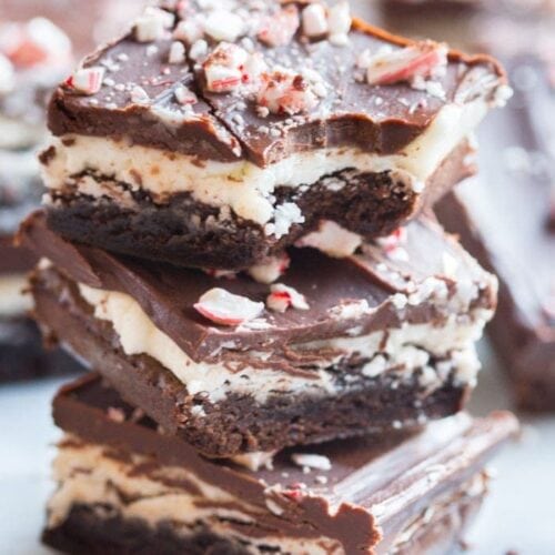 Unbelievable peppermint chocolate layered brownies: tender brownie, creamy cool frosting, and rich pepperminty ganache. Oh. My. Heavens. // 40 Aprons