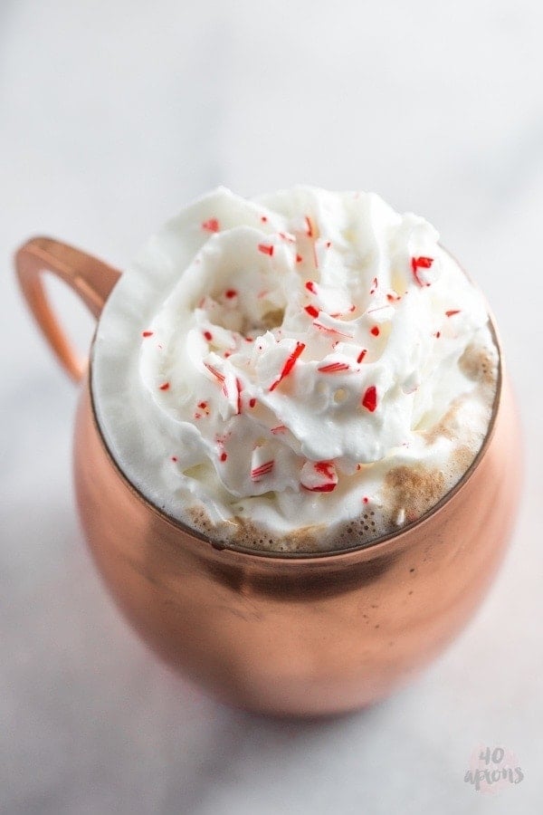 Spiked peppermint hot chocolate. So rich and creamy with the perfect peppermint kick.. truly a merry Christmas! // 40 Aprons