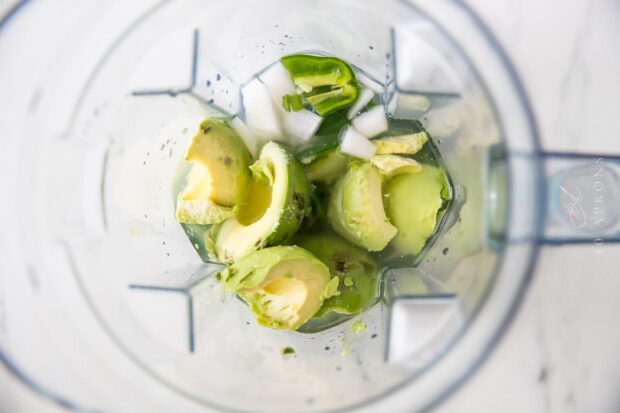 Avocado salsa ingredients in a blender