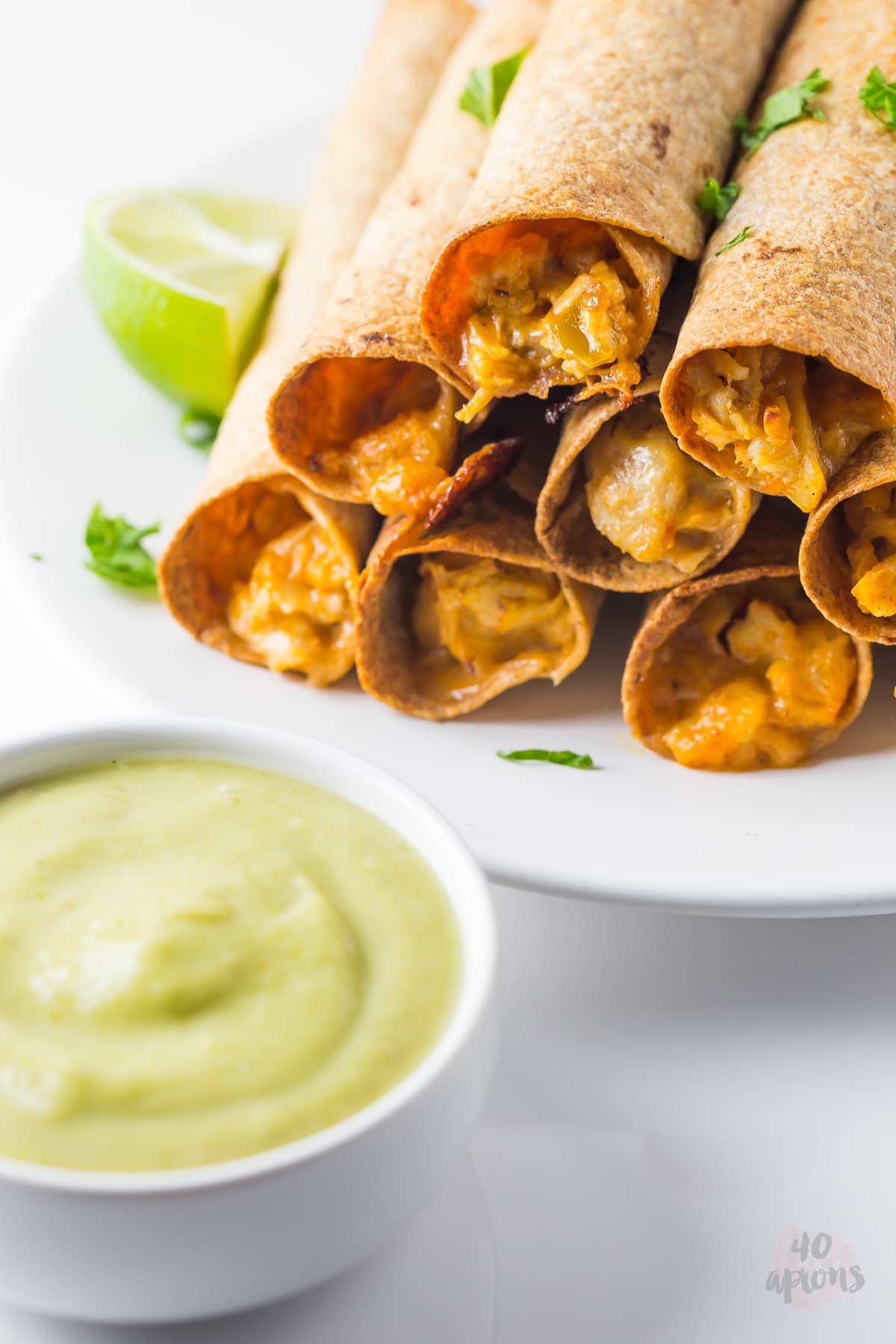 Cheesy chicken taquitos with avocado salsa (whole wheat!) // 40 Aprons