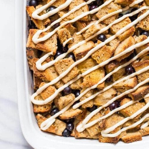 Healthy Overnight French Toast Casserole with Blueberries and Maple-Cream Cheese Glaze