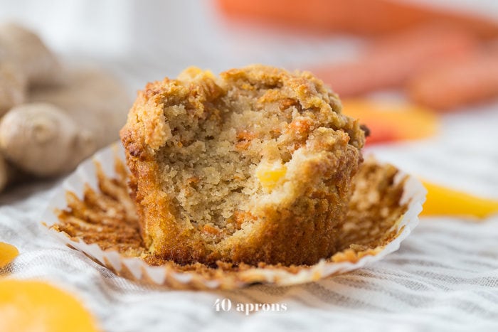 These peach ginger paleo muffins are moist and tender, full of fruity, fresh peaches and earthy ginger. The best thing about these paleo muffins? They don't taste like they're paleo! Grain-free, gluten-free, and refined sugar-free, these make an awesome paleo breakfast, too.