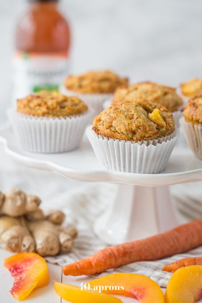 These peach ginger paleo muffins are moist and tender, full of fruity, fresh peaches and earthy ginger. The best thing about these paleo muffins? They don't taste like they're paleo! Grain-free, gluten-free, and refined sugar-free, these make an awesome paleo breakfast, too.