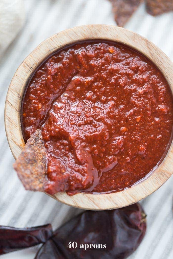 This smoky guajillo salsa recipe is deep and flavorful, full of toasted, dried guajillo chiles, garlic, and fresh tomatoes. It's the perfect smoky salsa recipe to keep in the fridge (at all times, pretty sure) so you can put it on all the things. Inspired by my favorite local taqueria salsa, you'll love this smoky salsa recipe, especially during warmer weather! Buy dried guajillo chiles here.