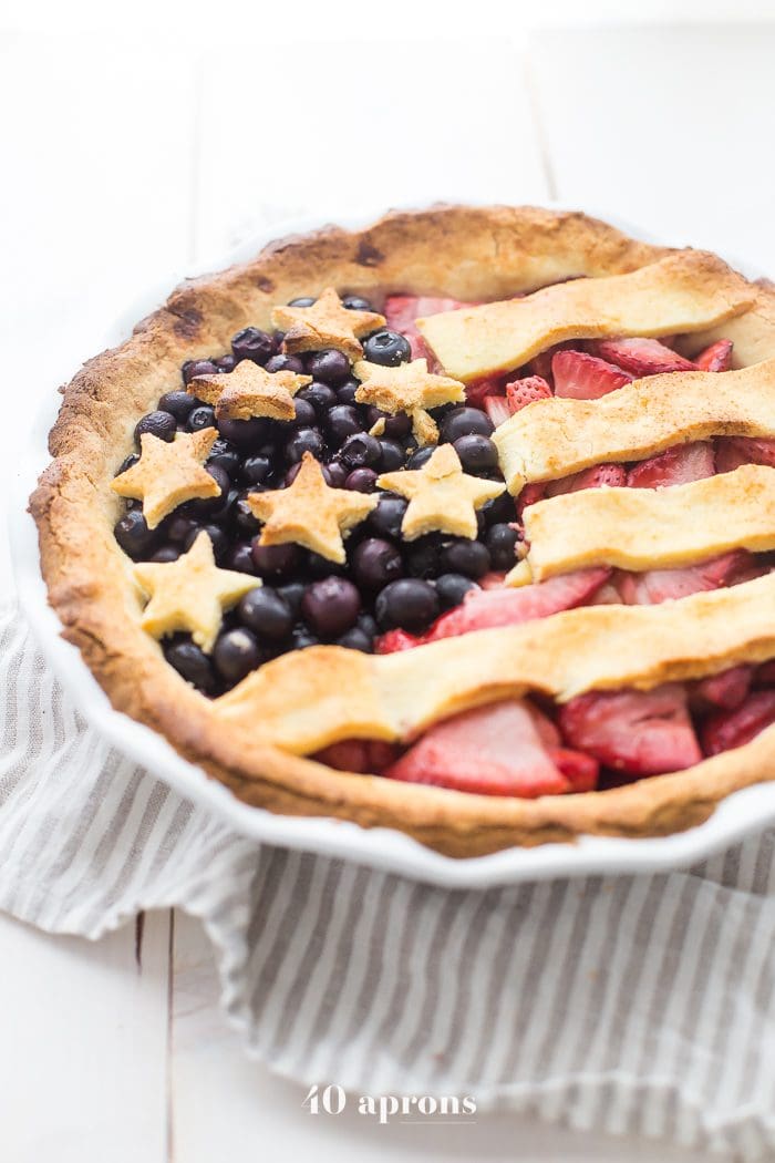 This paleo American flag pie is the absolute perfect paleo 4th of July dessert. Full of fresh strawberries and blueberries with a crunchy crust, it's a stellar paleo pie that's just stunning. Is there a better paleo pie for the ultimate paleo 4th of July dessert table? I think not!