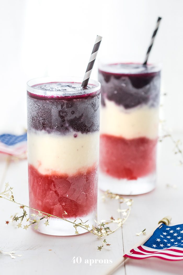 These paleo red, white, and blue cocktails are perfect 4th of July cocktails: boozy, fruity layers form a striking drink that tastes delish. Easy to make and free of refined sugar and dairy, these are the perfect Memorial Day cocktails, Labor Day cocktails, or heck, just paleo summer cocktails, too. U-S-A!