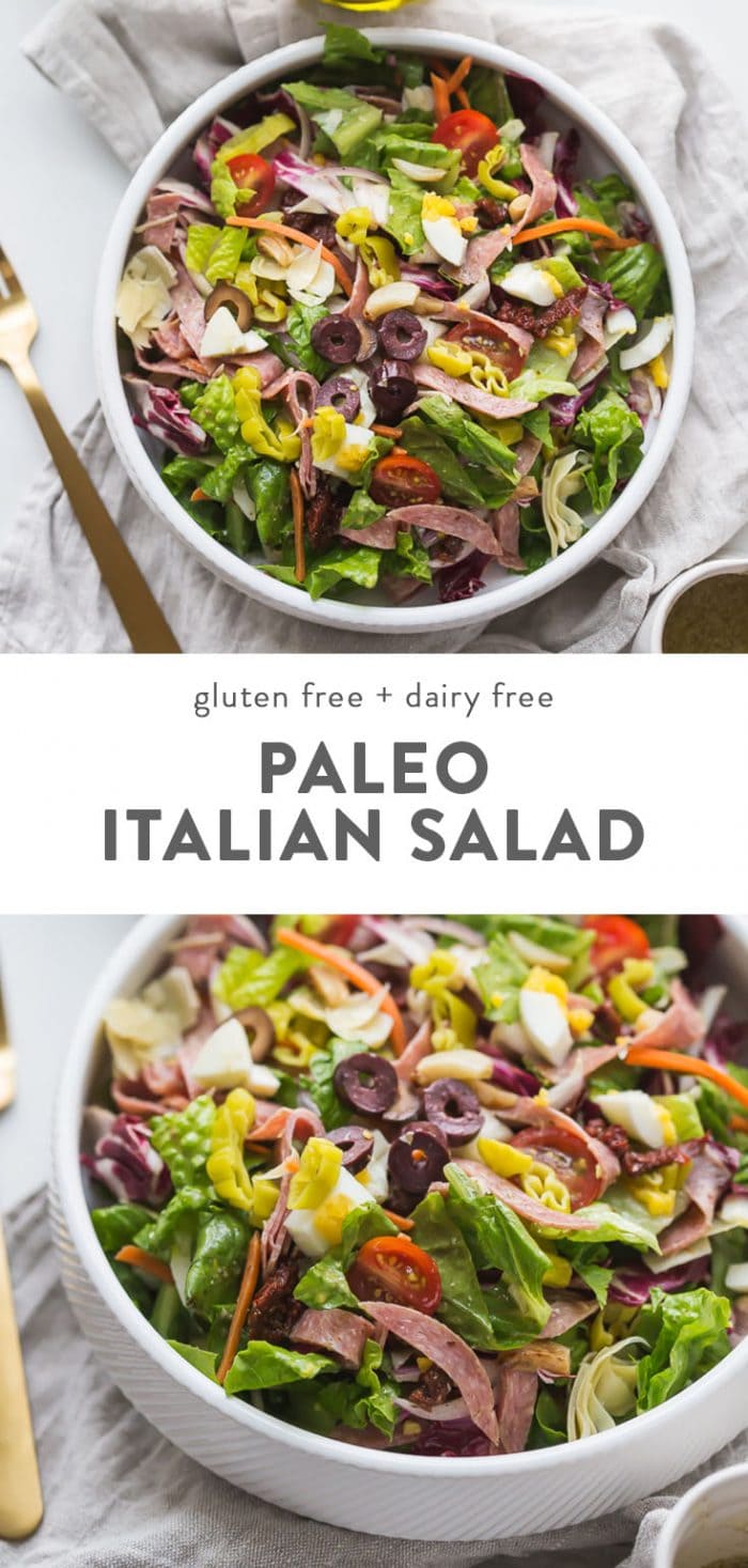 Paleo italian salad in a white salad bowl with a gold fork.