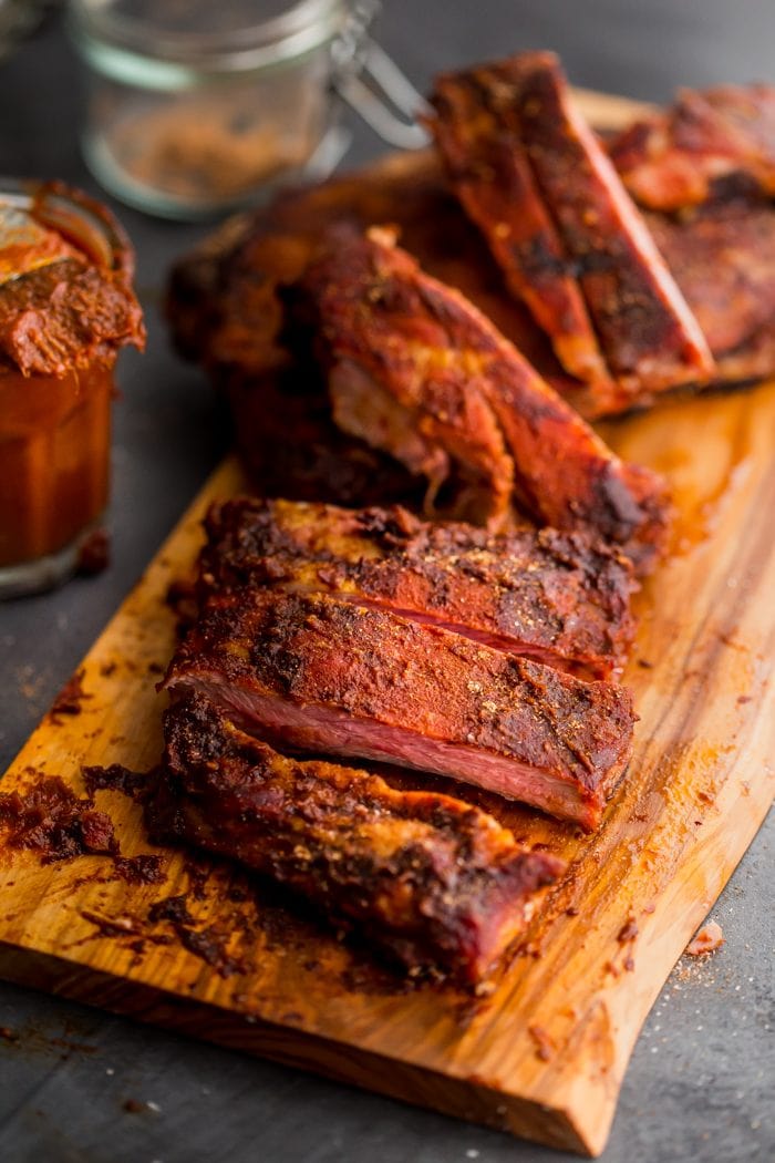 These Whole30 ribs are easy and cooked on the grill, making them a great Whole30 dinner! Smoky, spicy, and full of flavor, they're delicious with my Whole30 BBQ sauce. Definitely the perfect Whole30 ribs or Whole30 dinner now that football season is upon us!