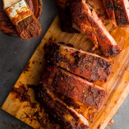 These Whole30 ribs are easy and cooked on the grill, making them a great Whole30 dinner! Smoky, spicy, and full of flavor, they're delicious with my Whole30 BBQ sauce. Definitely the perfect Whole30 ribs or Whole30 dinner now that football season is upon us!