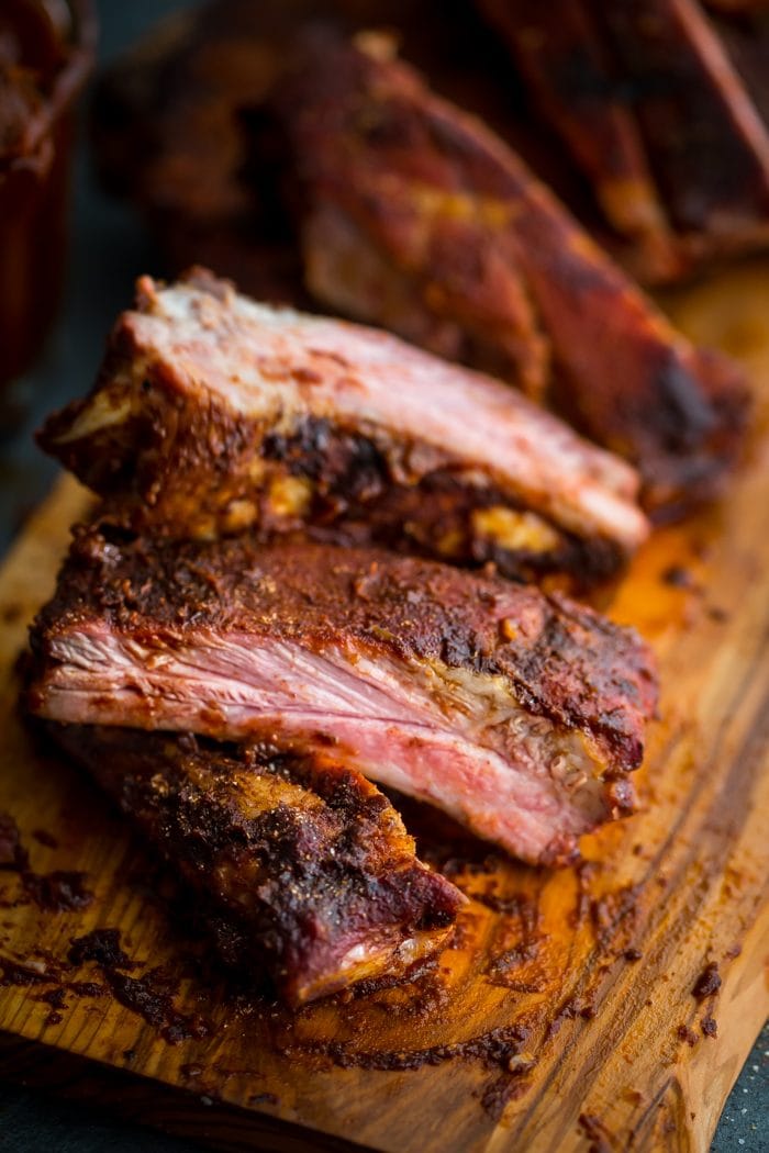 These Whole30 ribs are easy and cooked on the grill, making them a great Whole30 dinner! Smoky, spicy, and full of flavor, they're delicious with my Whole30 BBQ sauce. Definitely the perfect Whole30 ribs or Whole30 dinner now that football season is upon us!