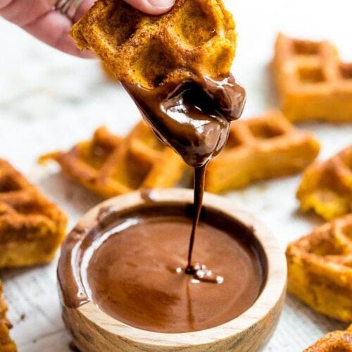 These paleo pumpkin churros with dark chocolate sauce are heavenly: loaded with fall flavor, crispy on the outside, tender on the inside, and made in the waffle iron! They're such a perfect paleo fall recipe because they're totally delicious but there's no frying necessary. These paleo pumpkin churros with dark chocolate sauce are a must make when it comes to paleo fall recipes!