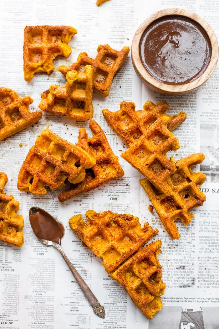 These paleo pumpkin churros with dark chocolate sauce are heavenly: loaded with fall flavor, crispy on the outside, tender on the inside, and made in the waffle iron! They're such a perfect paleo fall recipe because they're totally delicious but there's no frying necessary. These paleo pumpkin churros with dark chocolate sauce are a must make when it comes to paleo fall recipes!