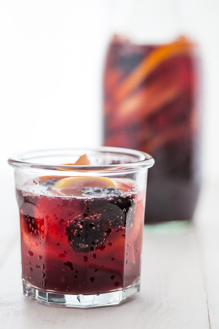 This paleo sangria is just like an authentic Spanish-style sangria but made with healthier ingredients. It's sweet, strong, and delicious, just like a paleo sangria should be! You'll love this paleo sangria because it's so easy to make ahead and only takes a few minutes to prepare, but it'll become an absolute favorite with your friends. But be warned: this paleo sangria can be strong!