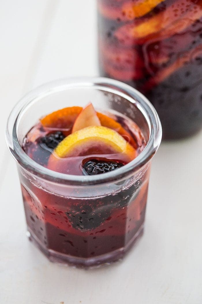 This paleo sangria is just like an authentic Spanish-style sangria but made with healthier ingredients. It's sweet, strong, and delicious, just like a paleo sangria should be! You'll love this paleo sangria because it's so easy to make ahead and only takes a few minutes to prepare, but it'll become an absolute favorite with your friends. But be warned: this paleo sangria can be strong!