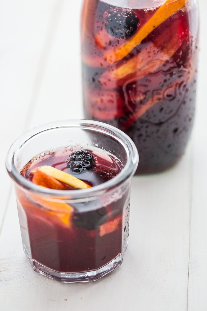 This paleo sangria is just like an authentic Spanish-style sangria but made with healthier ingredients. It's sweet, strong, and delicious, just like a paleo sangria should be! You'll love this paleo sangria because it's so easy to make ahead and only takes a few minutes to prepare, but it'll become an absolute favorite with your friends. But be warned: this paleo sangria can be strong!