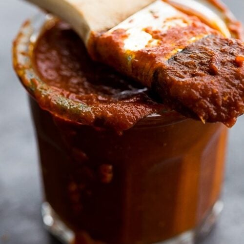 This Whole30 BBQ sauce is a delicious Whole30 condiment. Perfect on ribs, pulled pork, or chicken, this Whole30 BBQ sauce is spiced with chipotle powder and lightly sweetened with coconut aminos. A jar of this Whole30 BBQ sauce in the fridge will mean plenty of simple, flavorful Whole30 dinners!