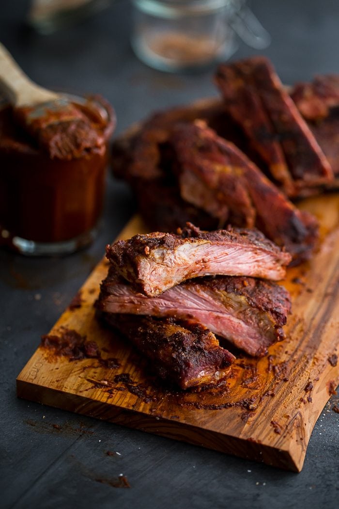 This Whole30 BBQ sauce is a delicious Whole30 condiment. Perfect on ribs, pulled pork, or chicken, this Whole30 BBQ sauce is spiced with chipotle powder and lightly sweetened with coconut aminos. A jar of this Whole30 BBQ sauce in the fridge will mean plenty of simple, flavorful Whole30 dinners!