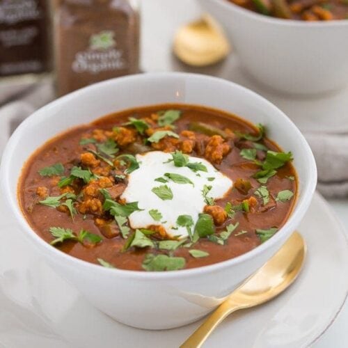 This chicken tikka masala chili is the stuff your dreams are made of. This Whole30 chili has a rich and creamy tomato sauce, with beautiful caramelized onions, garlic, and chiles, loaded with tender ground chicken and veggies. Inspired by my beloved chicken tikka masala recipe, this chicken tikka masala chili is a must make for fall! It'll surely become your favorite Whole30 chili, too.