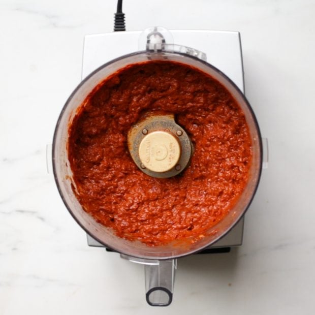 homemade harissa spice paste in the bowl of a food processor