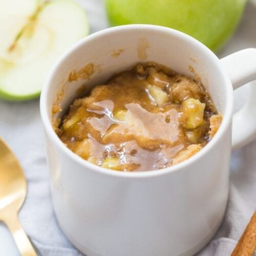 This paleo caramel apple microwave cake is inexplicably good, with a moist cinnamon-spiced cake, tender green apples, and a 2-minute caramel sauce to top it all. I bet you'll make this paleo caramel apple microwave cake all the time, since it only take a few minutes to stir together and two minutes in the microwave to cook! This paleo caramel apple microwave cake is the perfect paleo microwave dessert. I'm obsessed!