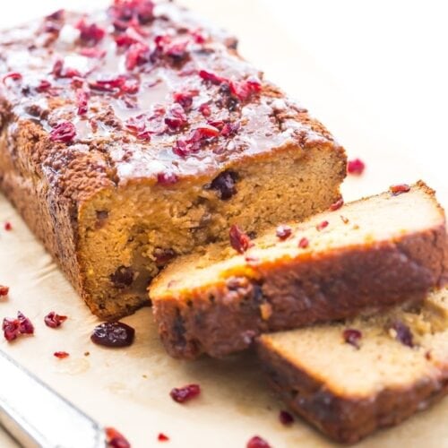 This paleo cranberry orange pound cake is such a wonderful paleo fall recipe! With fresh orange flavor and sweet-tart dried cranberries, this paleo cranberry orange pound cake is tender, moist, and full of flavor. This paleo cranberry orange pound cake takes full advantage of such a fantastic flavor combo and uses all healthier ingredients to make a lovely paleo fall recipe! Plus, details on how to put together the best pregnancy care package (not for me!).