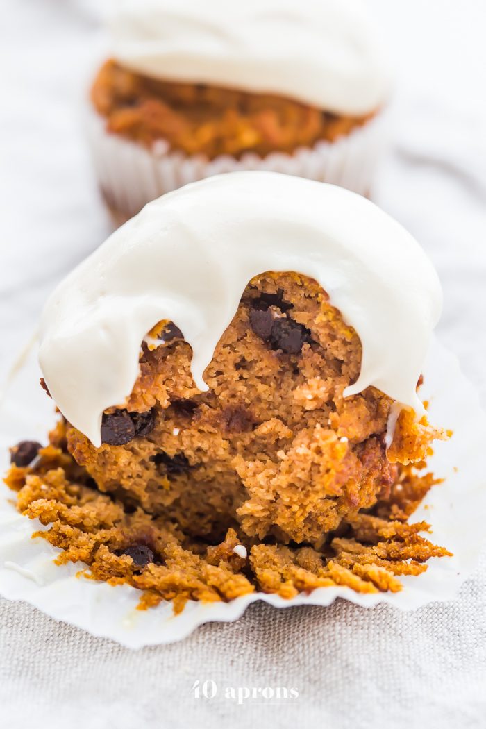 These paleo pumpkin chocolate chip muffins with cream cheese frosting are the perfect paleo fall recipe or paleo pumpkin recipe! They're moist and tender, loaded with pumpkin purée, dairy-free chocolate chips, and topped with a tangy but sweet frosting. And yep, they're entirely paleo. These paleo pumpkin chocolate chip muffins with cream cheese frosting are actually easy to make, too, so they'll become your very favorite paleo fall recipe or paleo pumpkin recipe for sure!