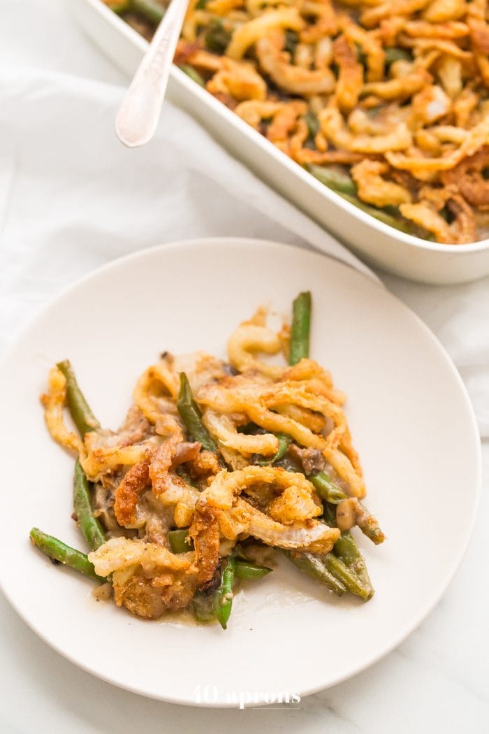 This Whole30 green bean casserole is just like the classic Thanksgiving dish: tender green beans in a rich cream of mushroom sauce, topped with fried onion straws. This Whole30 green bean casserole (also a paleo green bean casserole, of course!) is an absolute must for the Whole30 Thanksgiving table. And to be honest, this paleo green bean casserole tastes even better than the classic version! 