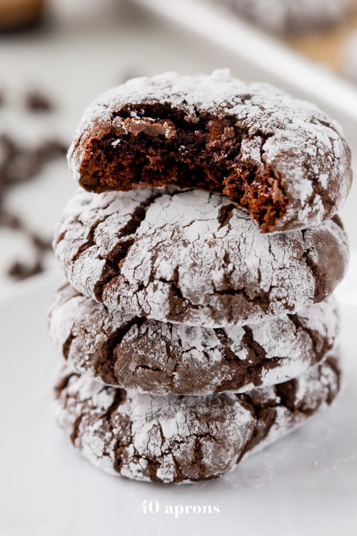 These peppermint paleo gluten-free crinkle cookies are fudgy and rich, perfect for the holidays. Grain-free and refined-sugar-free, these paleo gluten-free crinkle cookies are a guilt-free way to indulge in holiday treats without breaking your commitment to a healthier lifestyle. These paleo gluten-free crinkle cookies have hints of peppermint, making them positively festive. Your friends and family will never believe these gluten-free crinkle cookies are paleo!