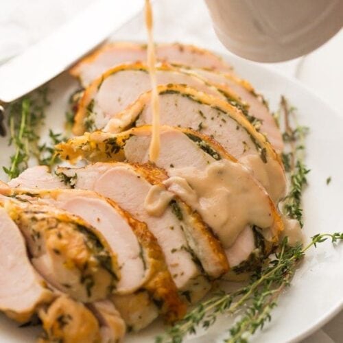 This Whole30 turkey breast and gravy is epic: brined to perfection with an herb butter stuffed under the skin (using ghee, of course)! It's my perfect Thanksgiving turkey made Whole30 Thanksgiving compliant, and it's a must for any paleo Thanksgiving or Whole30 Thanksgiving! This Whole30 turkey breast and gravy might actually become your favorite turkey recipe...