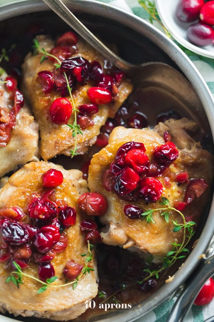 This Whole30 cranberry chicken is a simple but flavorful Whole30 dinner recipe that you'll love in the fall and winter! With just a few recipes, this Whole30 cranberry chicken is so good when you need a fruity flavor but want to keep it quick and easy. Bound to become a favorite Whole30 dinner recipe!