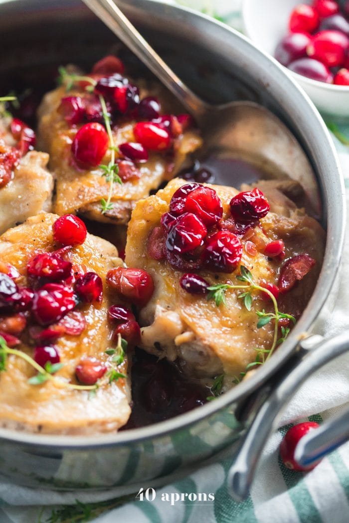 This Whole30 cranberry chicken is a simple but flavorful Whole30 dinner recipe that you'll love in the fall and winter! With just a few recipes, this Whole30 cranberry chicken is so good when you need a fruity flavor but want to keep it quick and easy. Bound to become a favorite Whole30 dinner recipe!