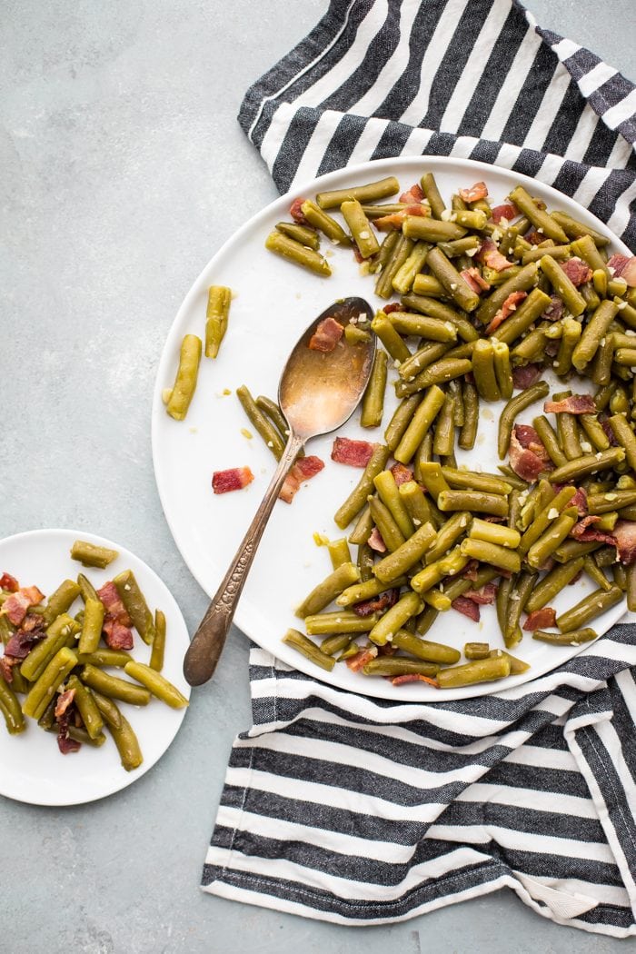 Whole30 Del Monte green beans with bacon in a white dish