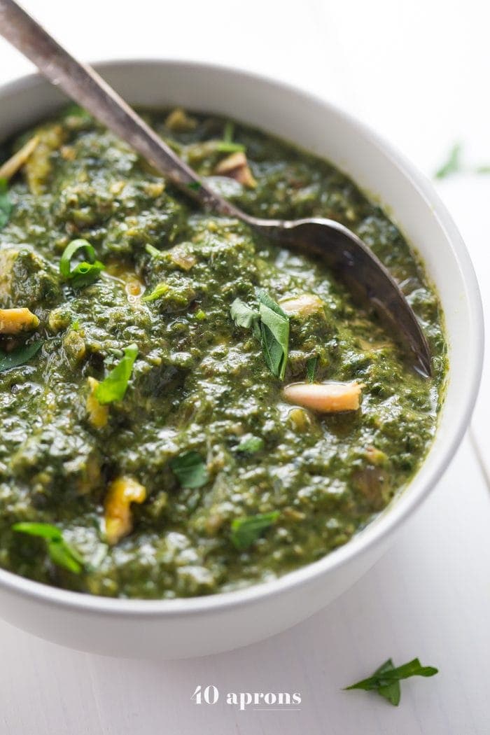 Whole30 Indian saag chicken in a white bowl