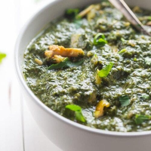 Whole30 Indian saag chicken in a white bowl