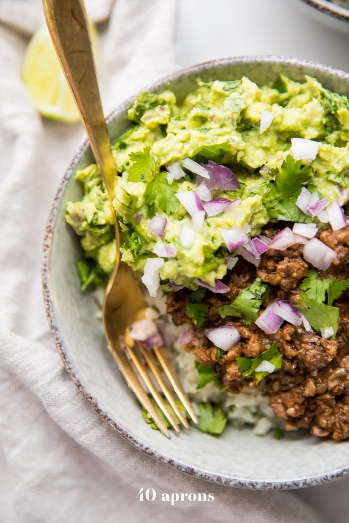 Whole30 chipotle beef & avocado bowl over cilantro-lime cauliflower rice