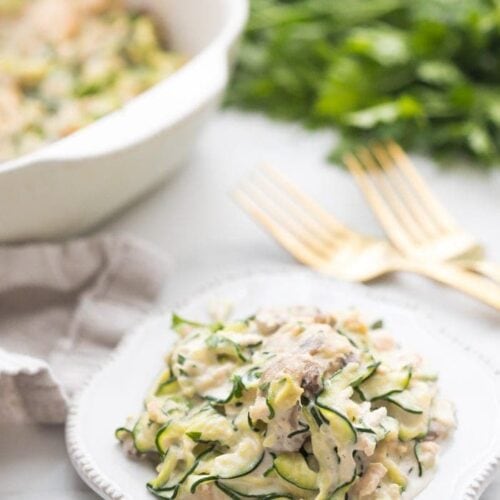 Whole30 tuna zoodle casserole on a plate next to a casserole