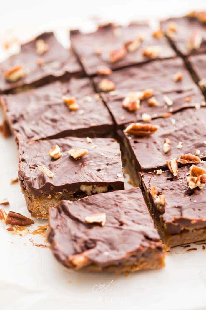 Batch of healthy paleo and vegan turtle bars on parchment paper